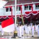 Wali Kota Surabaya Kenakan Baju Adat Minangkabau dalam Upacara HUT ke-80 RI dan Tekankan Kesejahteraan Kota.