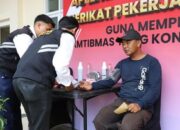 Polresta Malang Gelar Bakti Kesehatan untuk Buruh dalam Apel Kebangsaan